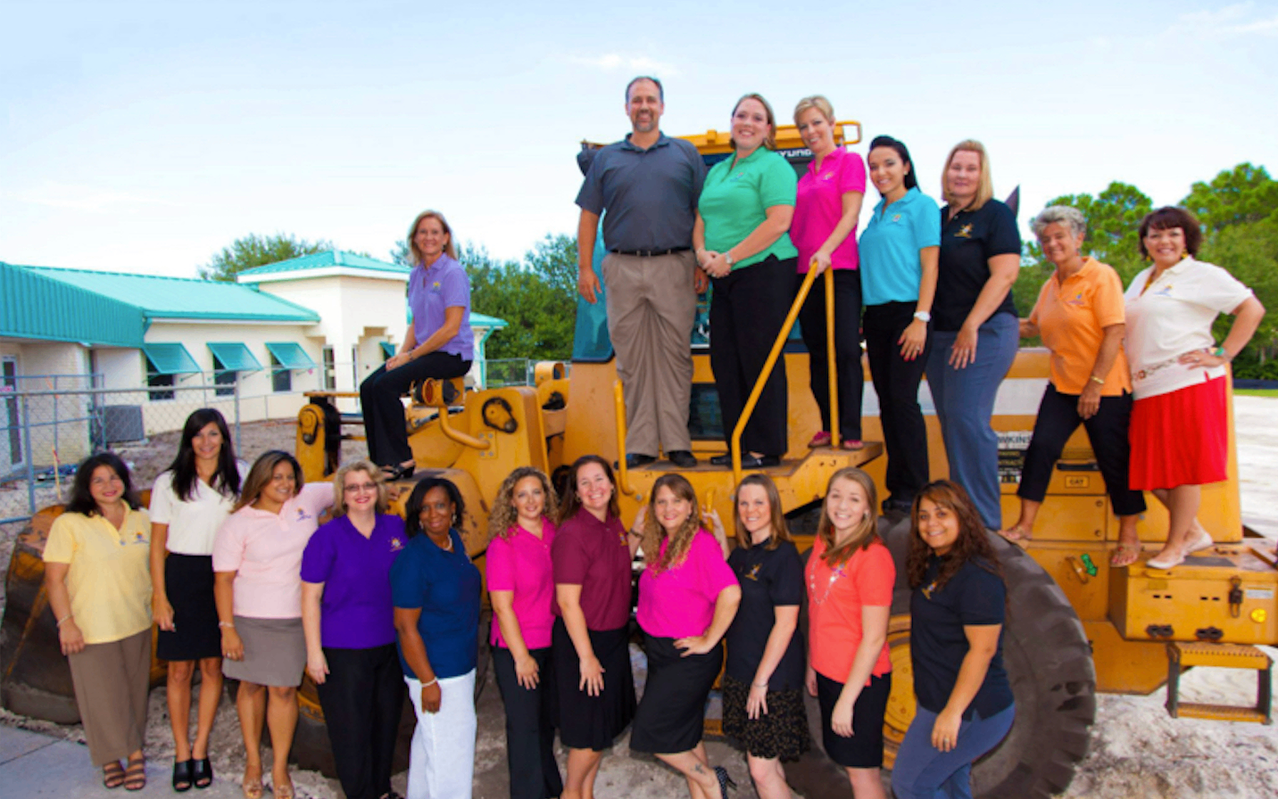 SCA staff on construction equipment